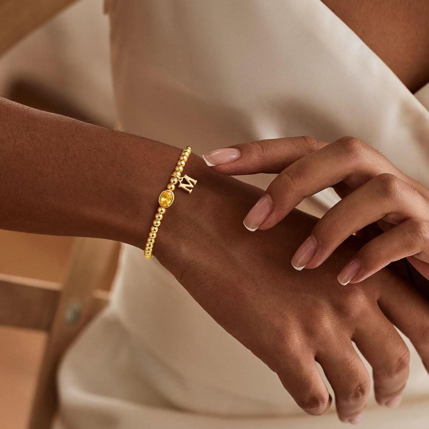 imageM MOOHAM Valentines Gifts for Her Women Kids Initial Birthstone Bracelet Elastic 14KGoldPlated Bead Bracelets Birthstone Bracelets Jewelry Valentines Gifts for Mom Sister Wife Girlfriend Teen GirlN